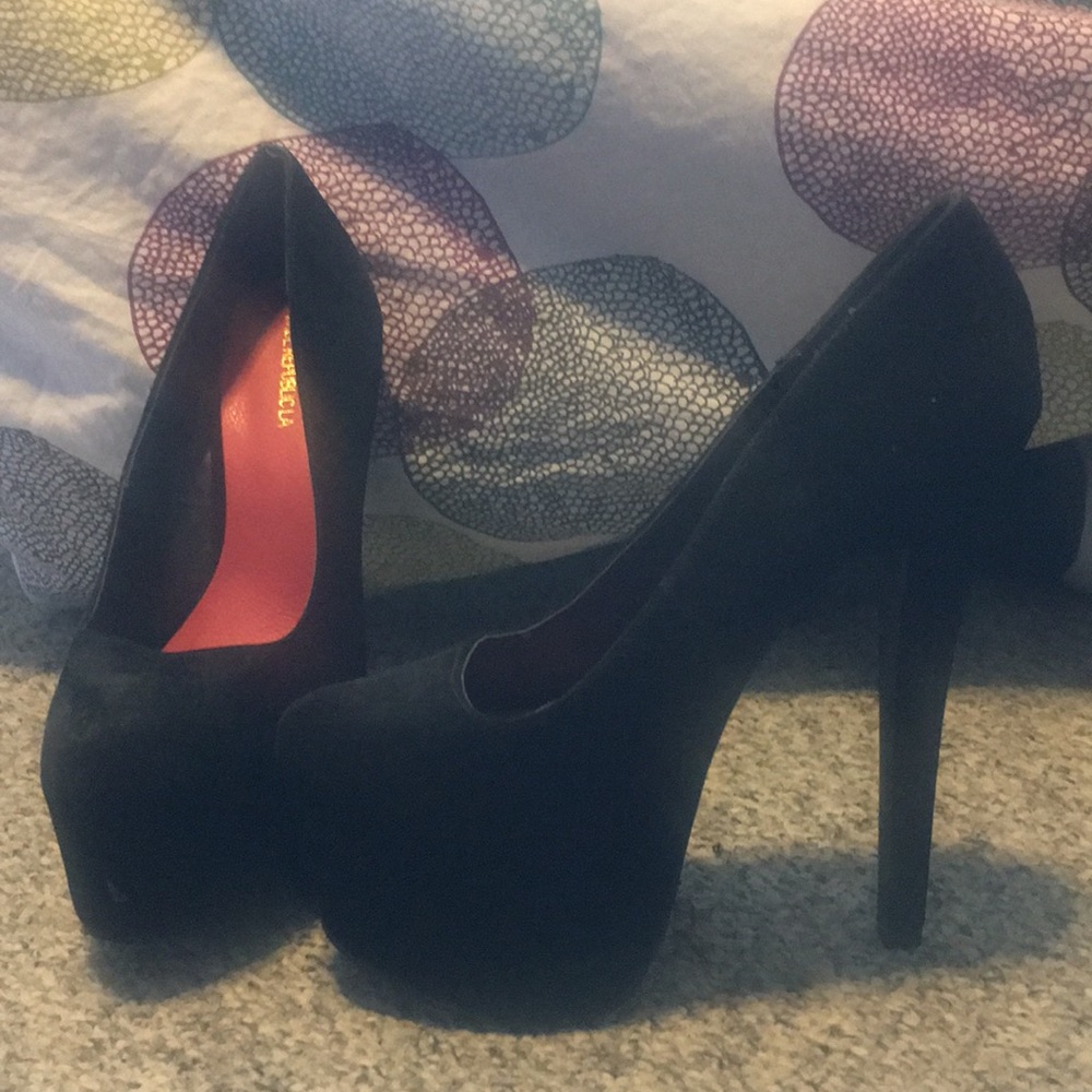 Black high heels with platform